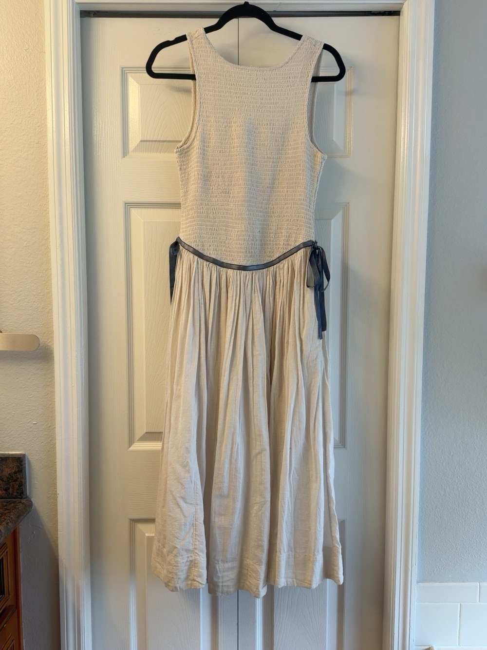 Sleeveless Cream Midi Dress with Navy Tie Waist